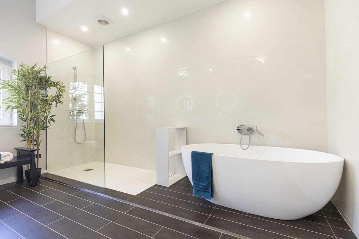 Modern bathroom with a freestanding tub and natural finishes